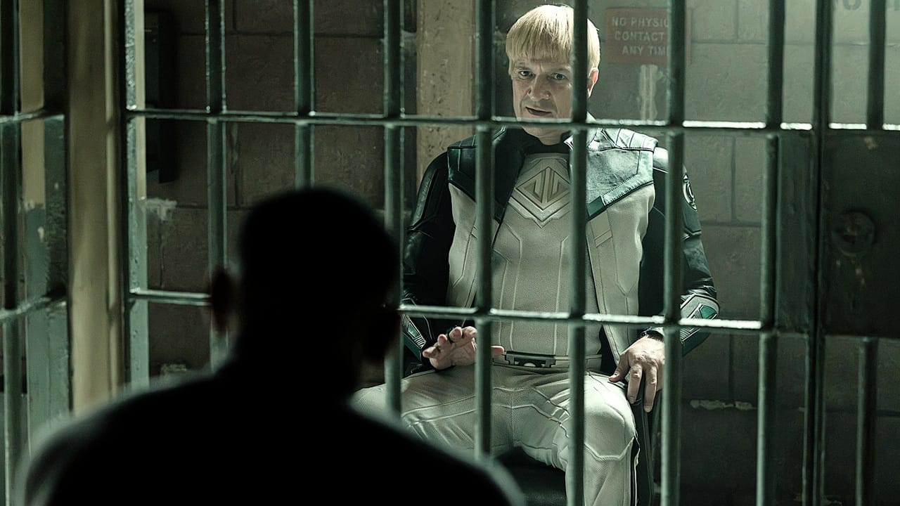 John Stewart, back to camera, in jail facing Guy Gardner from Lanterns