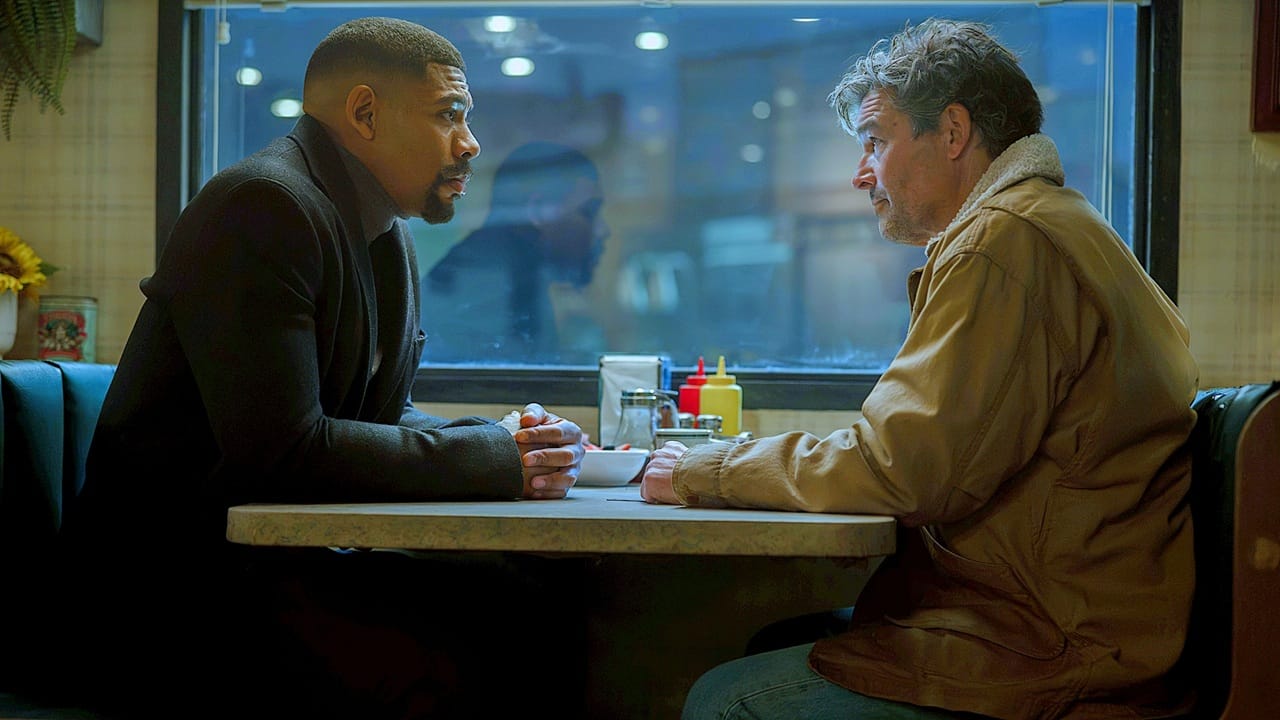 John stewart and Hal Jordan face each other in profile seated at a table in Lanterns