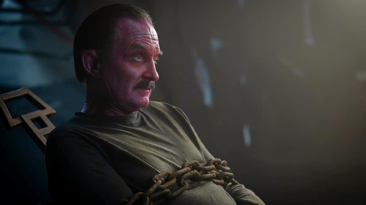 Sinestro chained to a chair from Lanterns