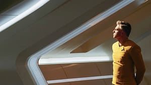 Captain-Pike-in-profile-looking-out-a-window-in-Star-Trek-Strange-New-Worlds