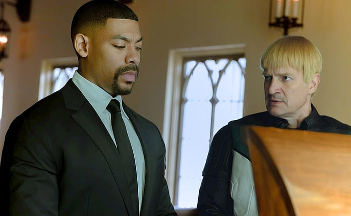 John Stewart and Guy Gardner at Hal Jordan's funeral from Lanterns
